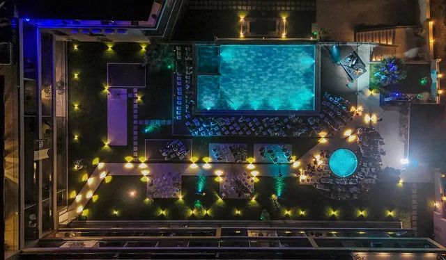 Royal Blue — illuminated pool and terrace from above
