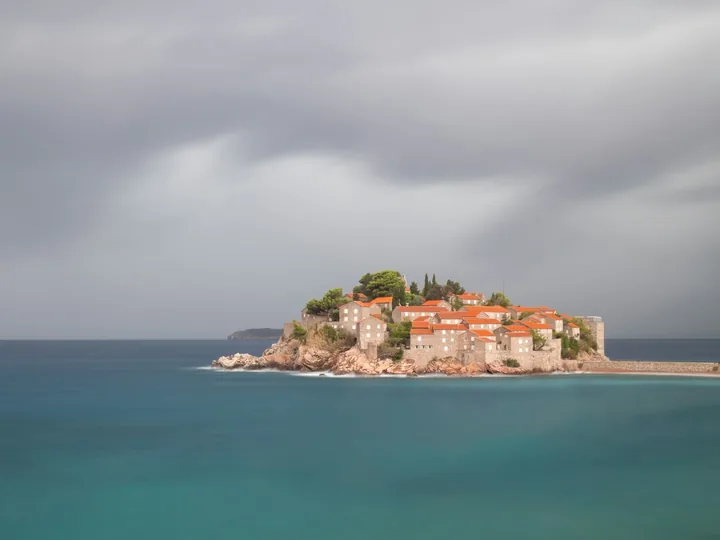 The Sveti Stefan islet and causeway seen against the Adriatic Sea